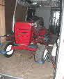 red tractor in van